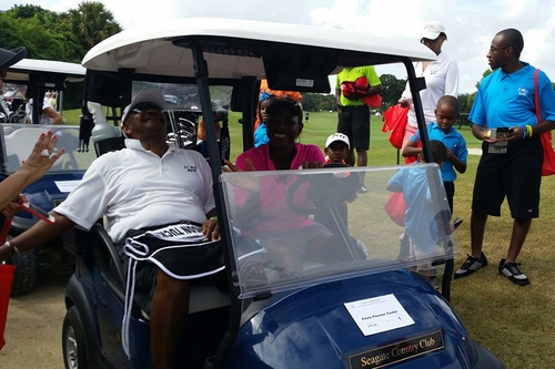 a-man-and-a-woman-in-golf-car