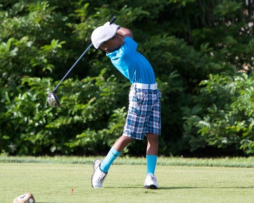 boy-playing-golf-with-full-passions