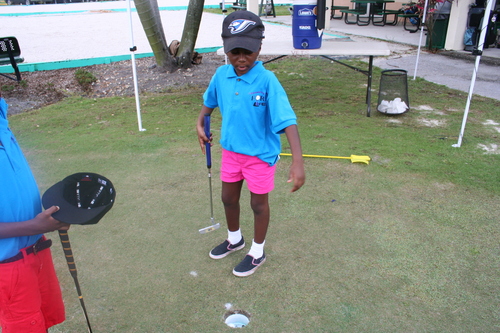 boy-playing-golf