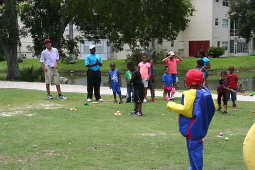 child-practicing-at-golf-ground-13