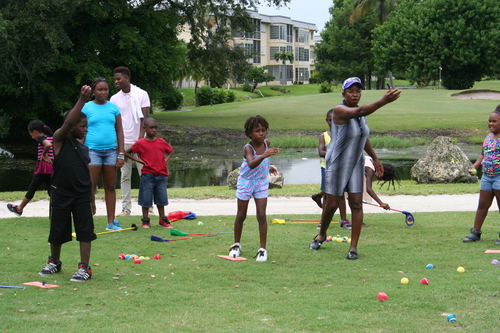 child-practicing-at-golf-ground-15