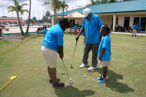 child-practicing-golf-15