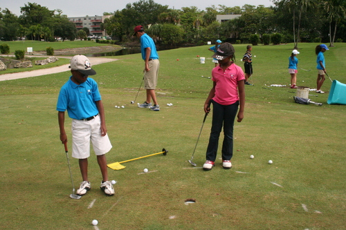 child-practicing-golf-4