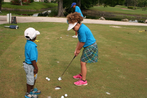 child-practicing-golf-6