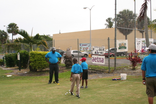 child-practicing-golf-7