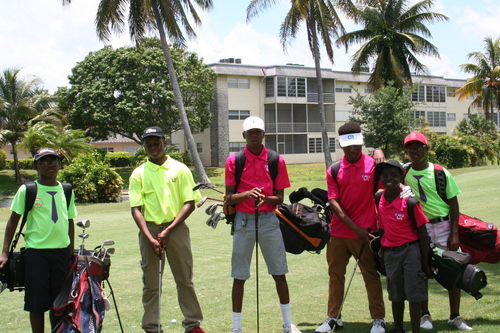 child-practise-golf-in-ground-11