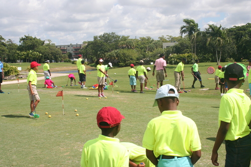 child-practise-golf-in-ground-17