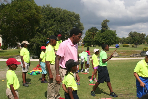 child-practise-golf-in-ground-5