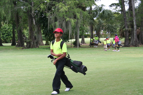 child-practise-golf-in-ground-9