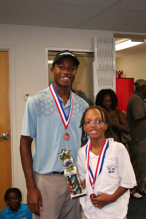 child-with-trophy