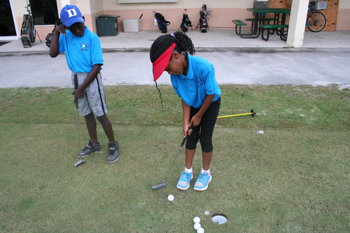 girl-playing-golf