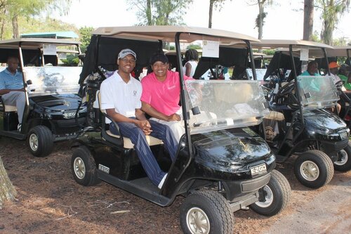two-men-at-golf-cart