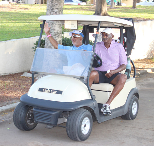 two-old-men-in-cart